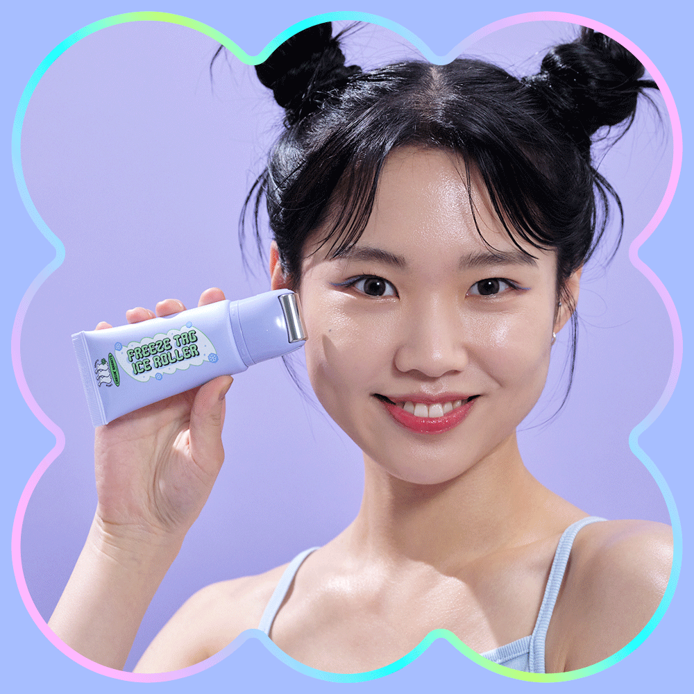 Woman using IT'S SKIN Freeze Tag Ice Roller on face, promoting skincare benefits in vibrant setting.