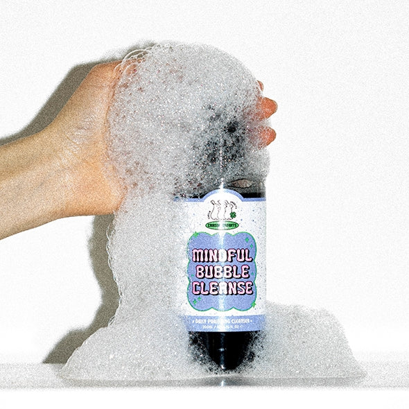 IT'S SKIN Minofull Bubble Cleanser 200ml surrounded by foam, held by a hand.