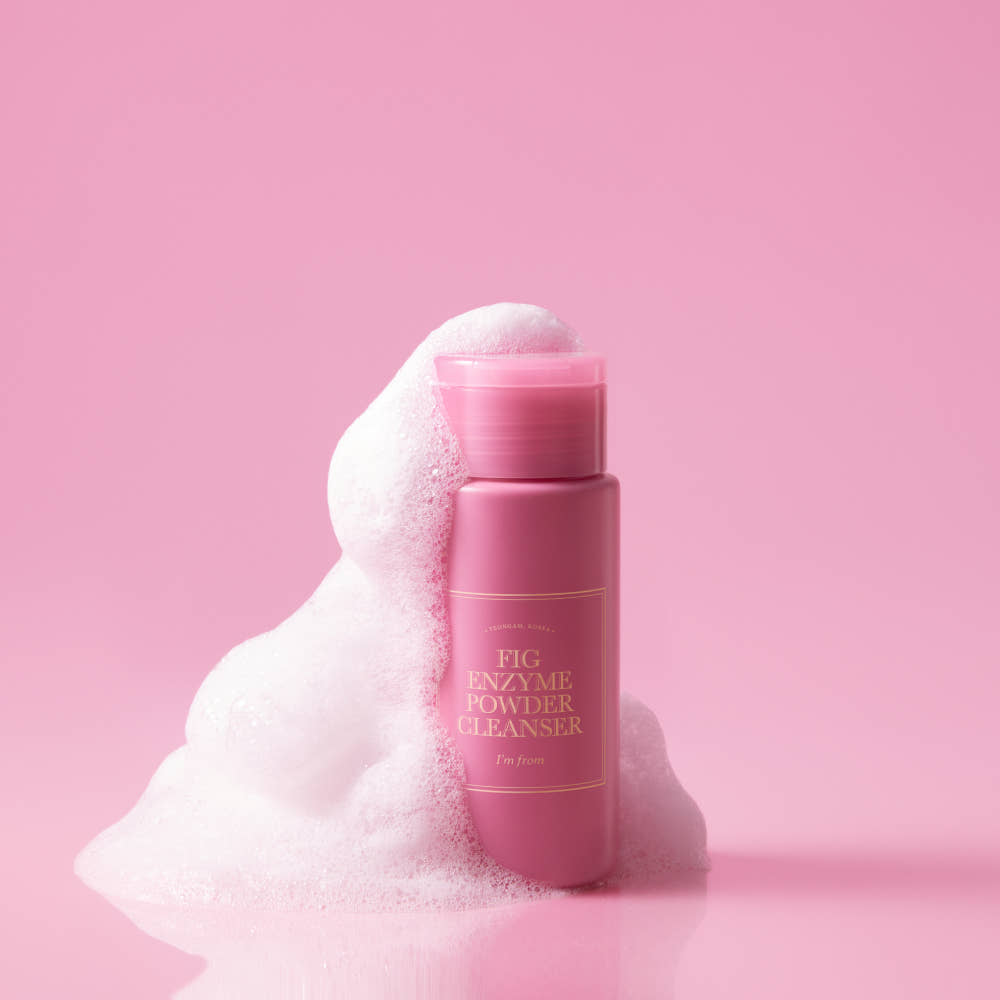 I'M FROM Fig Enzyme Powder Cleanser 50g with foaming bubbles on pink background.