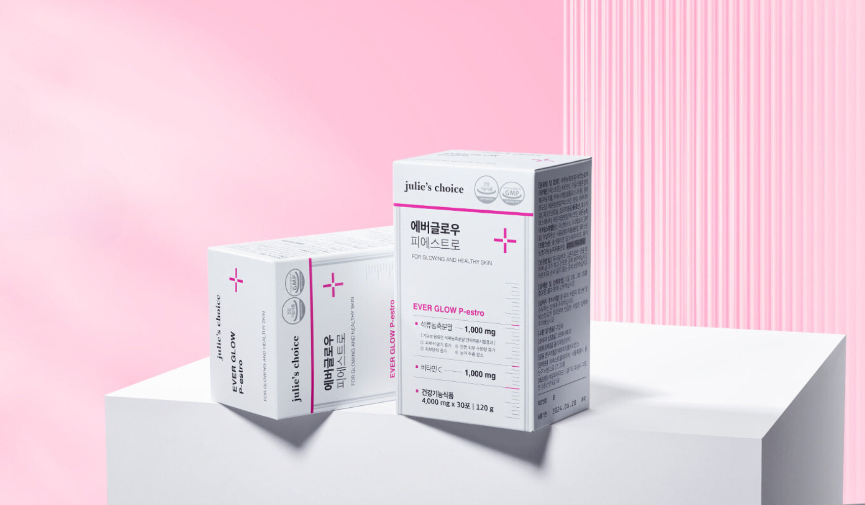 Two boxes of skincare product on pink and white background, featuring detailed packaging design.