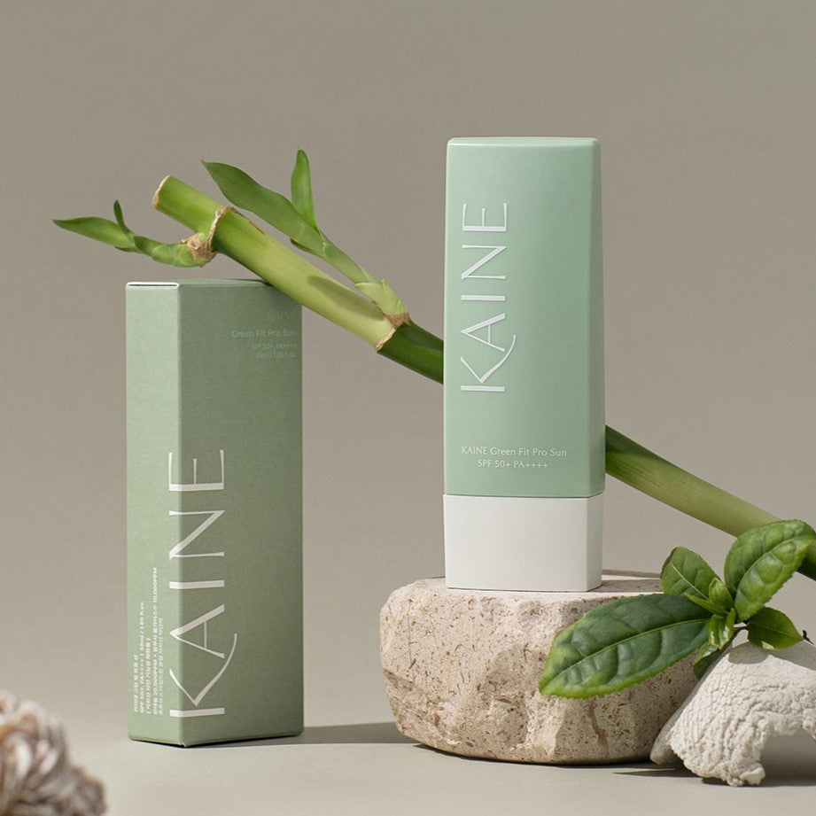 KAINE Green Fit Pro Sun cream 55ml displayed with bamboo and green leaves.