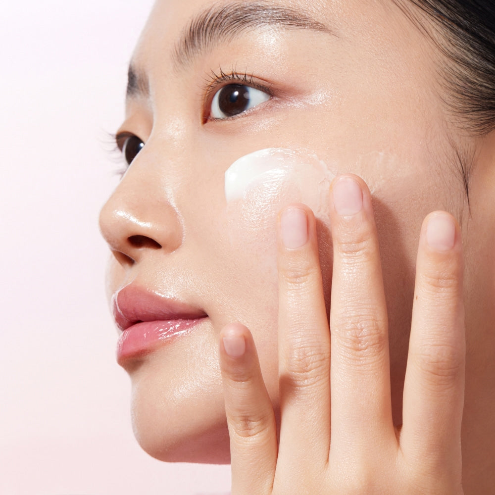 Applying KLAIRS Maple Energy Infusing Cream 60g on face for skincare