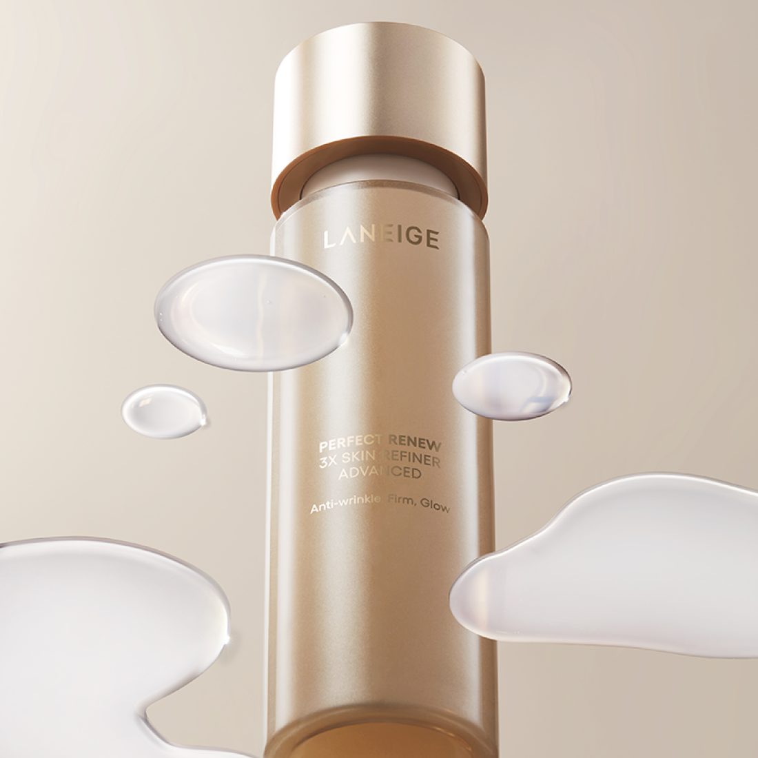 LANEIGE Perfect Renew 3X Skin Refiner Advanced 150ml bottle with liquid drops, anti-wrinkle product for firm and glowing skin.