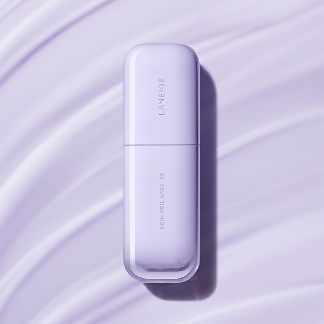 LANEIGE Skin Veil Base SPF28/PA++ 30ml in stylish packaging on a purple background