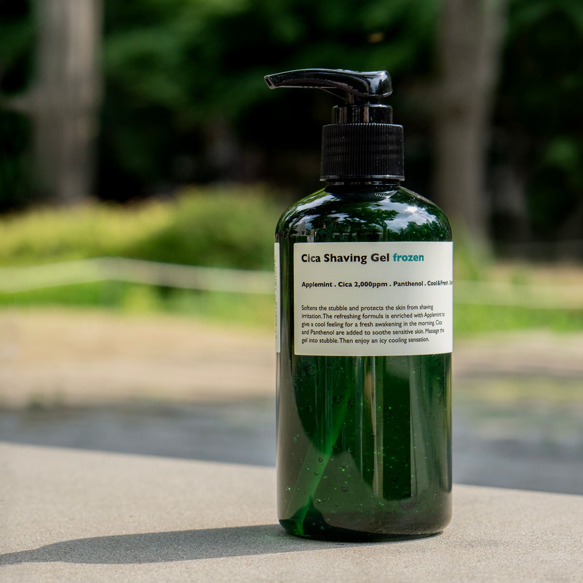 LAZY SOCIETY Cica Shaving Frozen 250ml bottle on outdoor table, Gentleman Korea men’s cooling shaving gel product