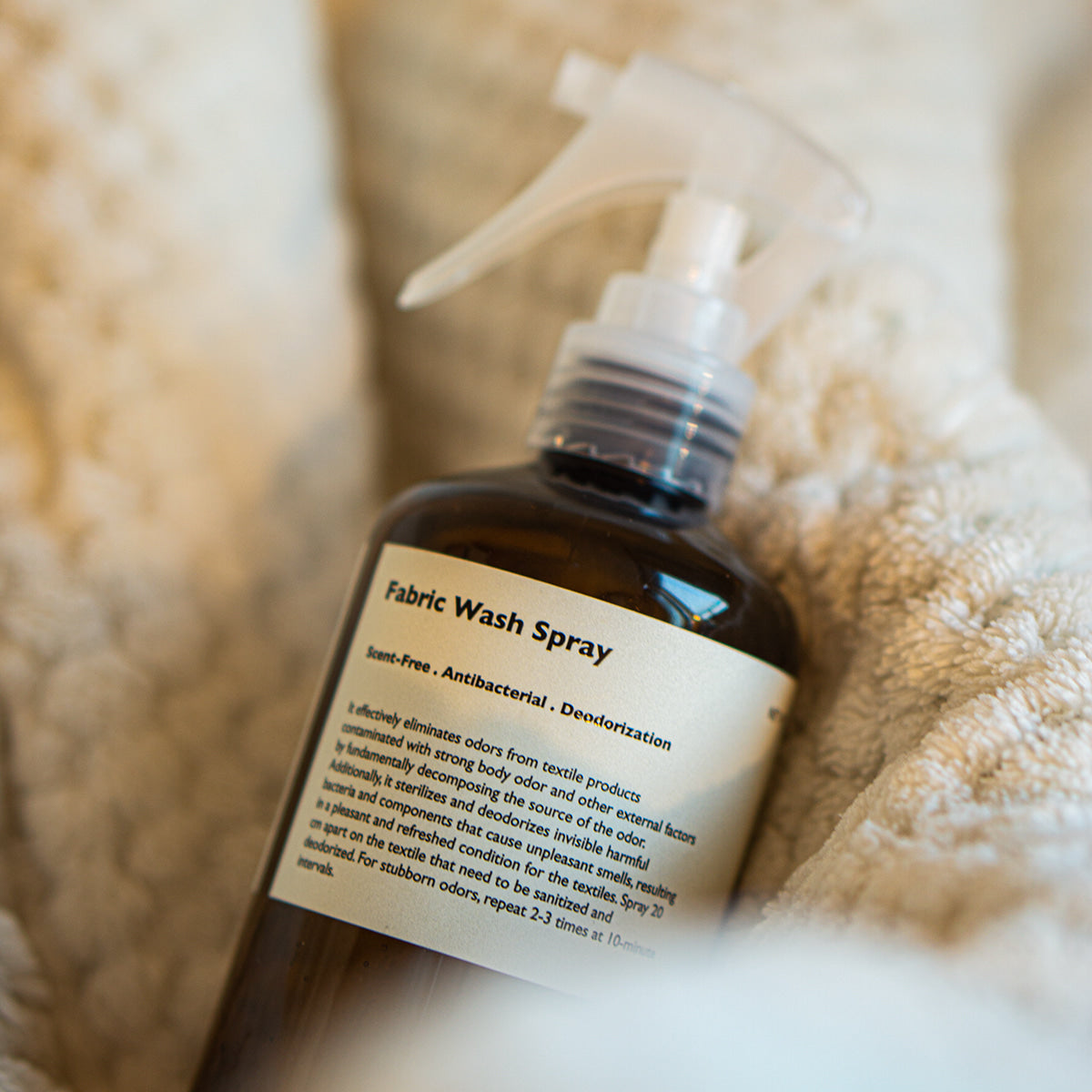 LAZY SOCIETY Fabric Fresh Spray 300ml on beige knit blanket, Gentleman's fabric deodorizer by Gentleman Korea
