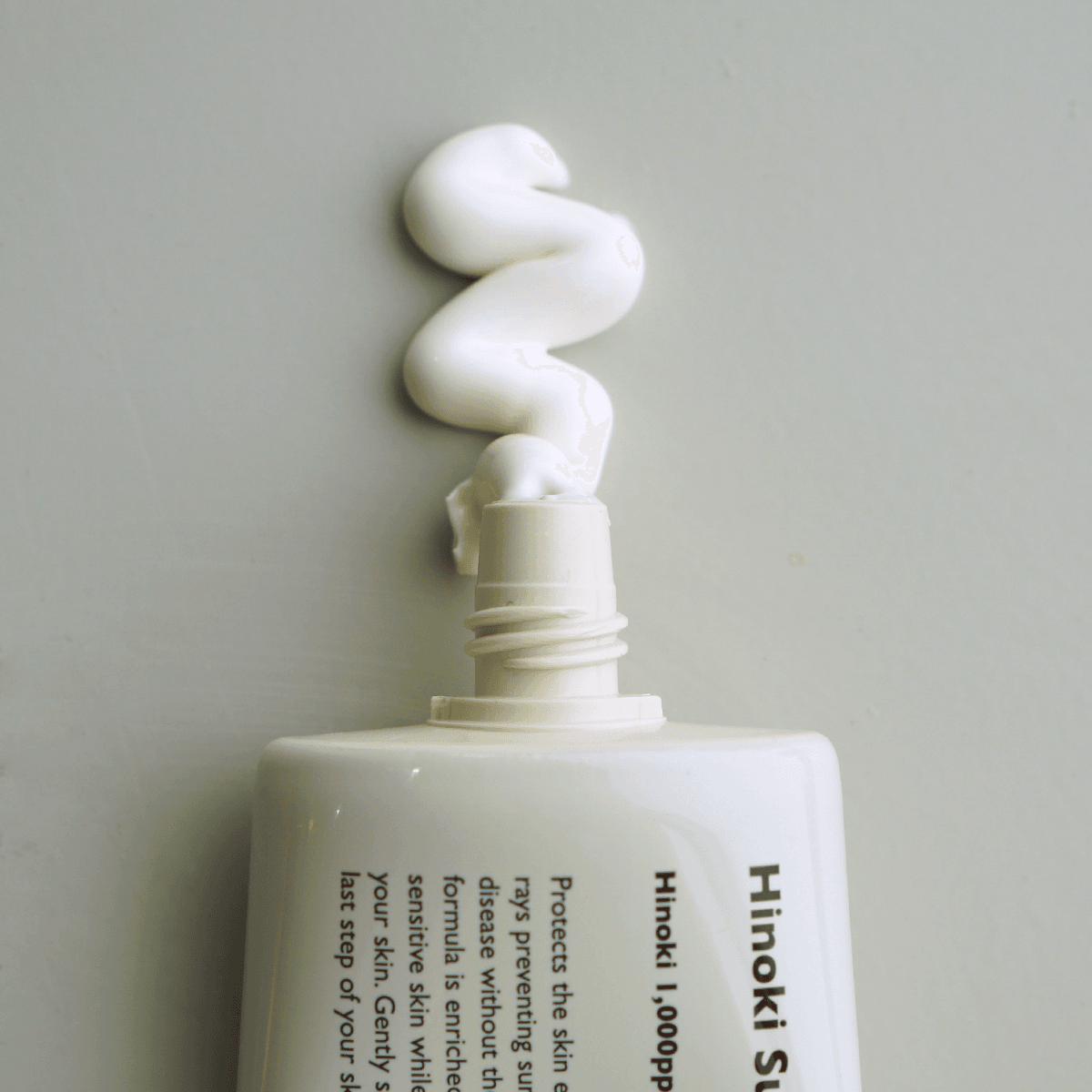 LAZY SOCIETY Hinoki Sunscreen SPPF 50+ PA+++ 50ml tube with white sunscreen cream swirled on top – Gentleman Korea skincare for men