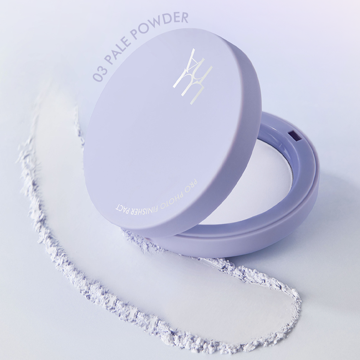 LUNA Pro Photo Finisher Blur Powder Pact 4 Colors in purple compact, shade 03 Pale Powder, showcased with powder trail.