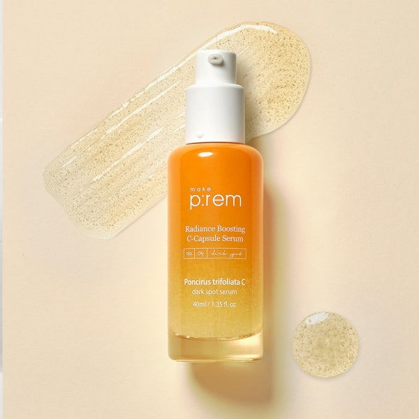 MAKE P:REM Poncirus Trifoliata C Dark Spot Serum 40ml bottle with golden liquid against a peach background.