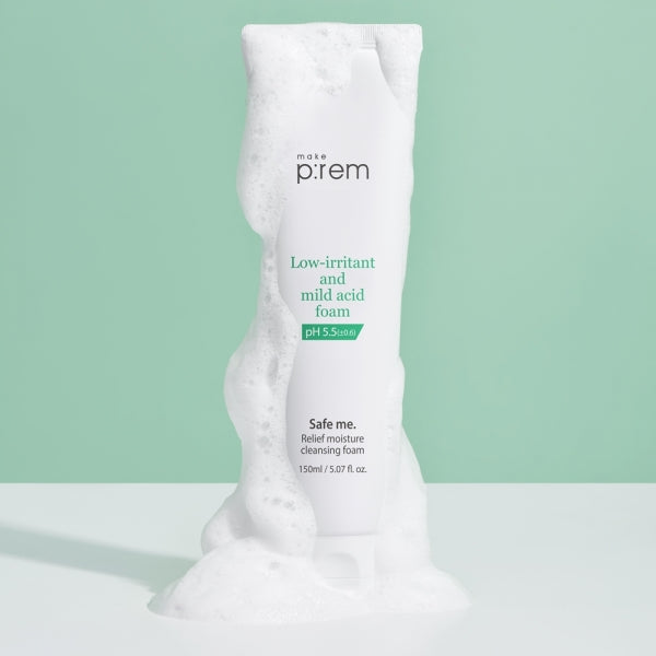 MAKE P:REM Safe Me Relief Moisture Cleansing Foam with gentle lather on a green background
