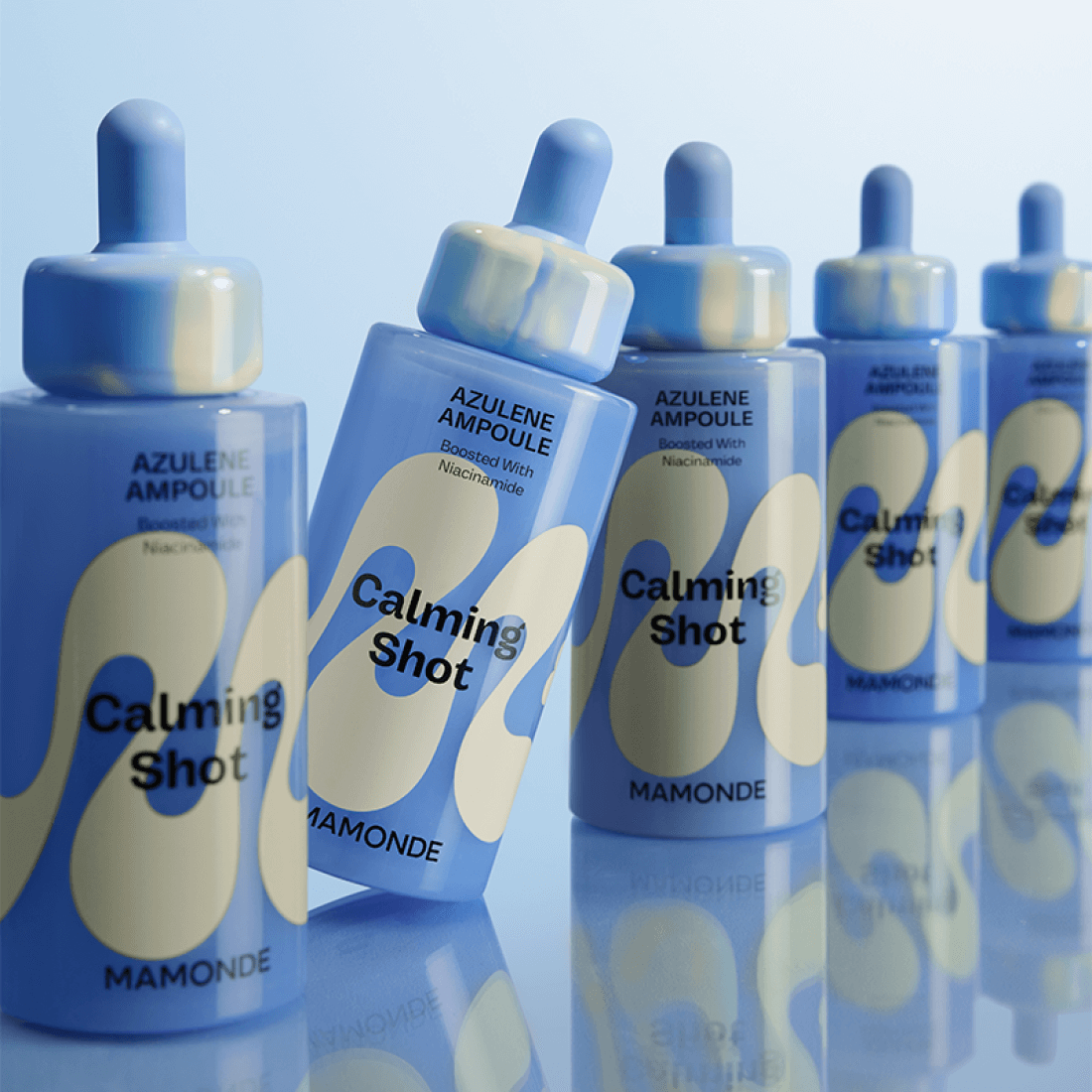 MAMONDE Calming Shot Azulene Trace Moisture Ampoule 50ml bottles displayed in a row against a light blue background