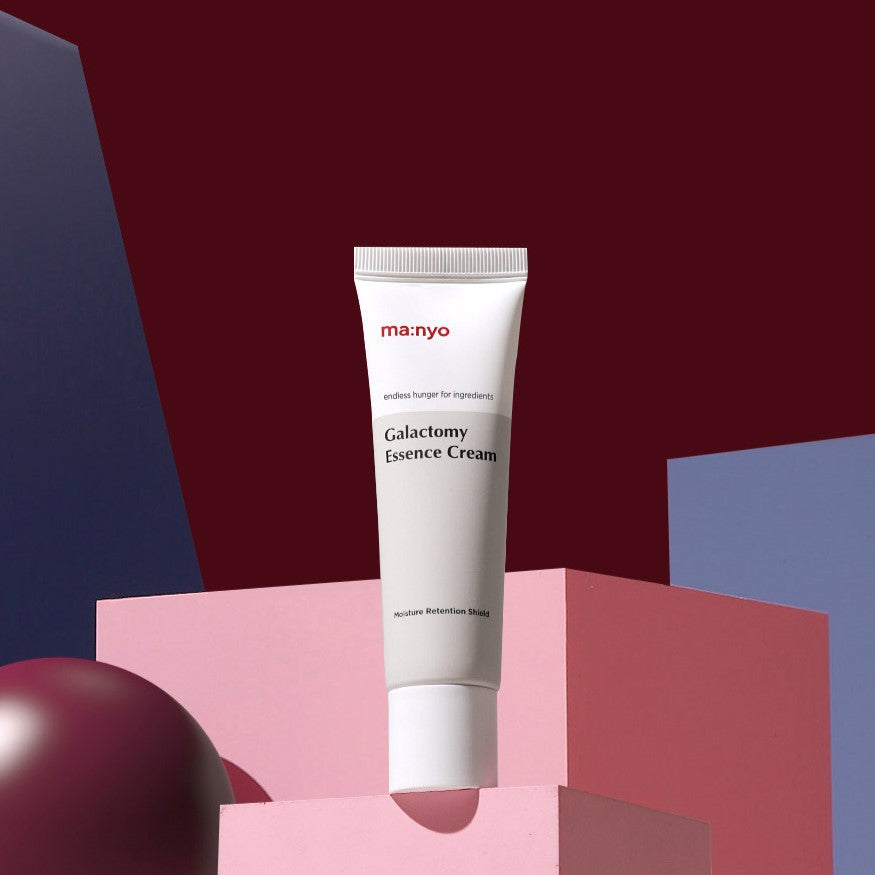 MA:NYO Galactomy Essence Cream 50ml displayed on a colorful geometric background