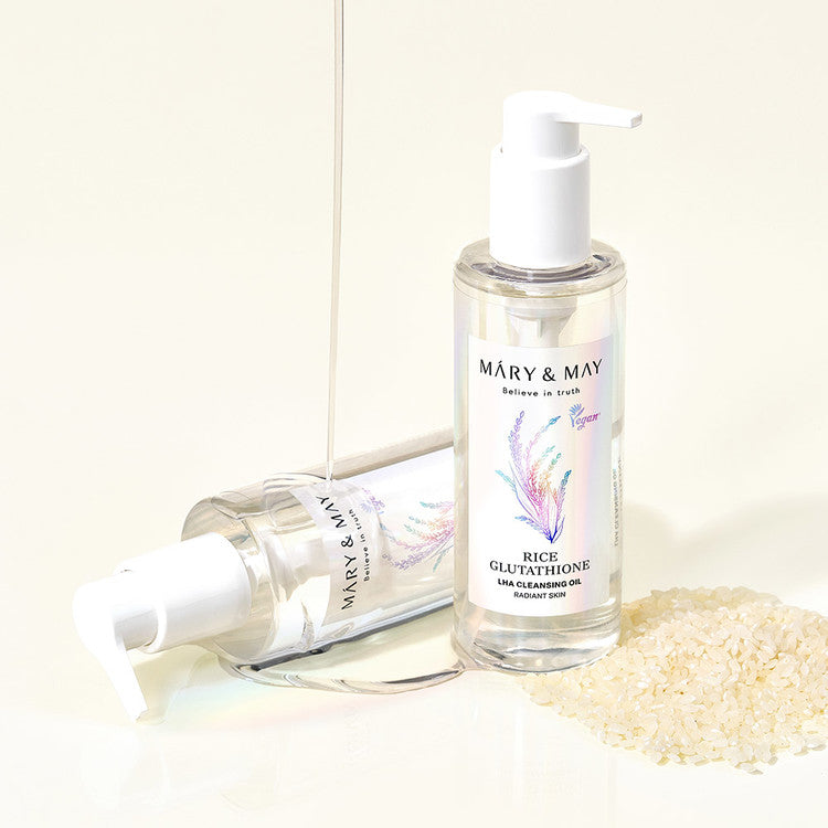 MARY&MAY Rice Glutathione Laha Cleansing Oil 200ml bottle with rice grains spilling beside it.
