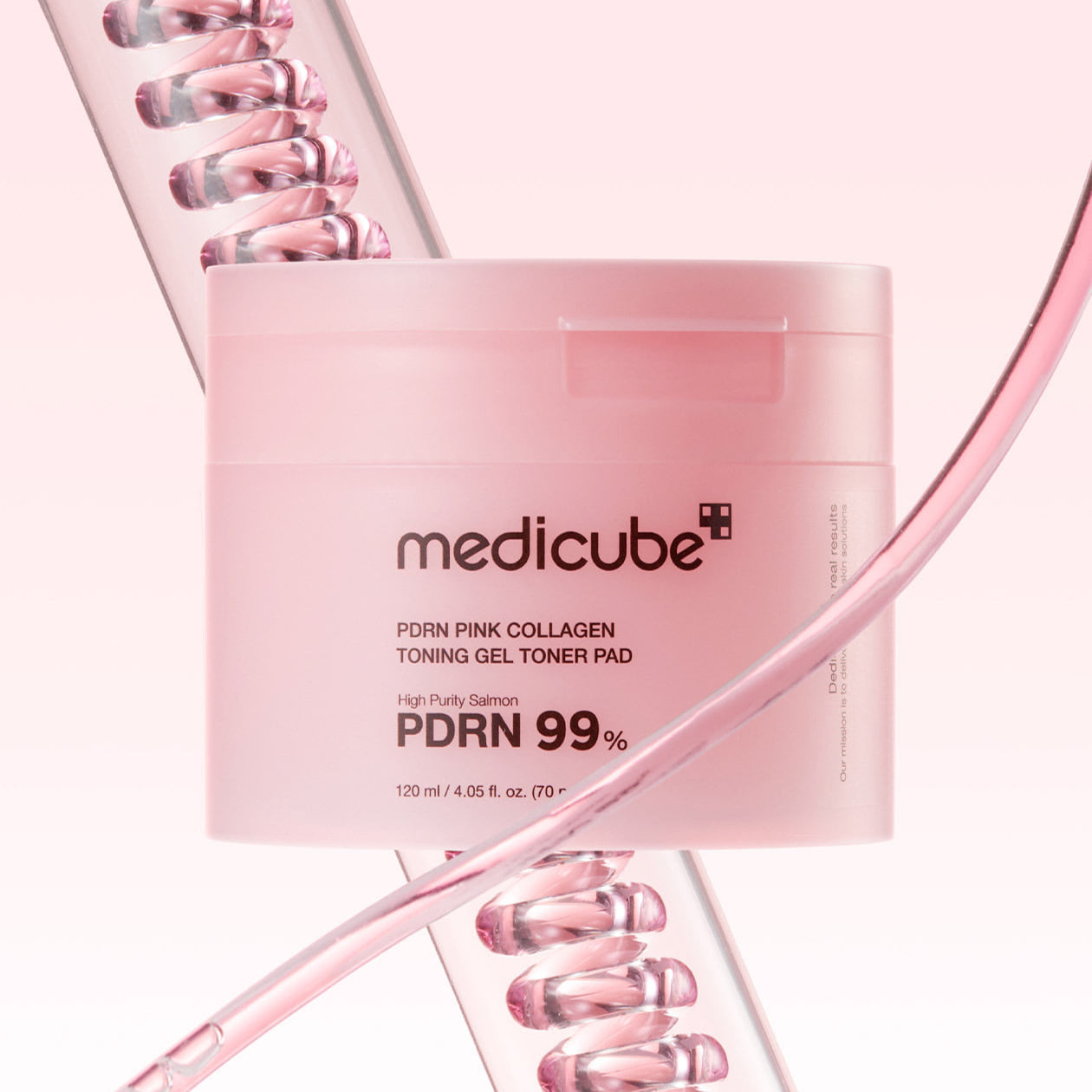 MEDICUBE PDRN Pink Collagen Toning Gel Toner Pad 70pads in pink packaging on artistic background