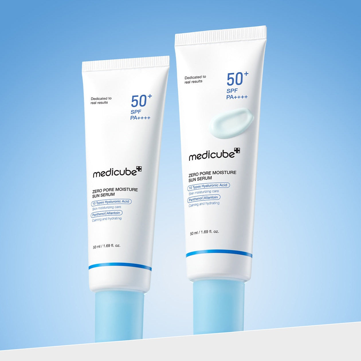 MEDICUBE Zero Pore Moisture Sun Serum 50ml with SPF 50+ PA++++ packaging on a blue background.