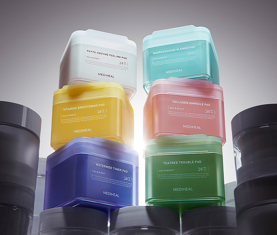 Stack of colorful MEDIHEAL Pad containers showcasing various skincare formulas.