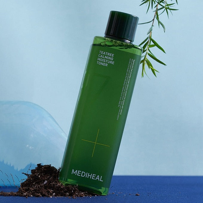 MEDIHEAL Teatree Calming Moisture Toner 350ml bottle with blue background and tea leaves, skincare product