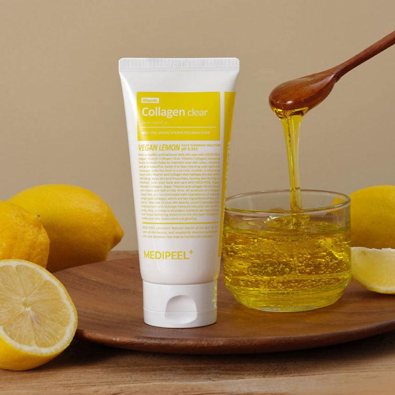 MEDIPEEL Vegan Vitamin Collagen Clear 300ml with lemons and honey on wooden tray