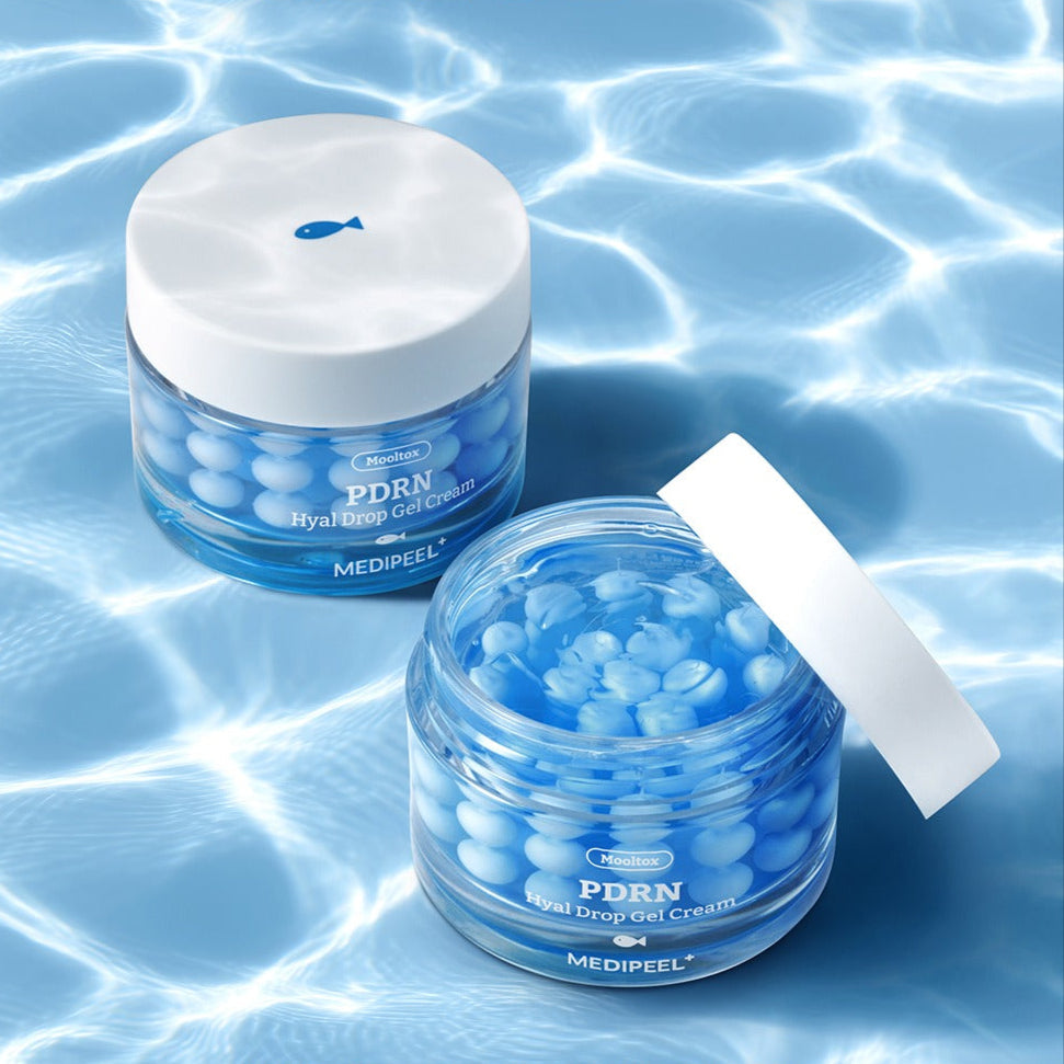 MEDIPEEL Water Tox PDRN Hyal Drop Gel Cream 50g in blue jar on watery background
