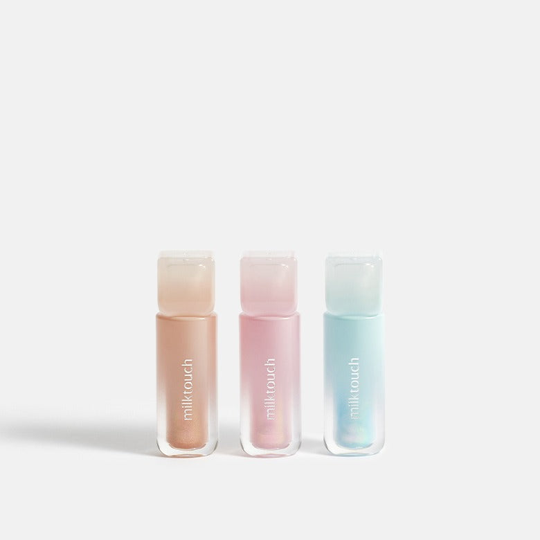 MILK TOUCH Dew Stain Sheer Aurora Gloss in three shades, showcasing soft, pastel colors for a subtle and radiant lip finish.