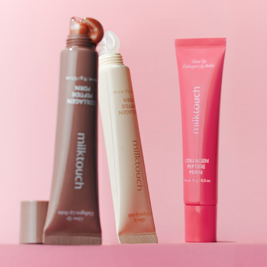 MILK TOUCH Glow Up Collagen Lip Balm 15g displayed with open and closed tubes on a pink background.
