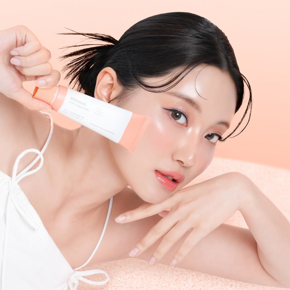 Woman holding MIXSOON PDRN Collagen Cream 50ml, showcasing glowing skin with the beauty product.