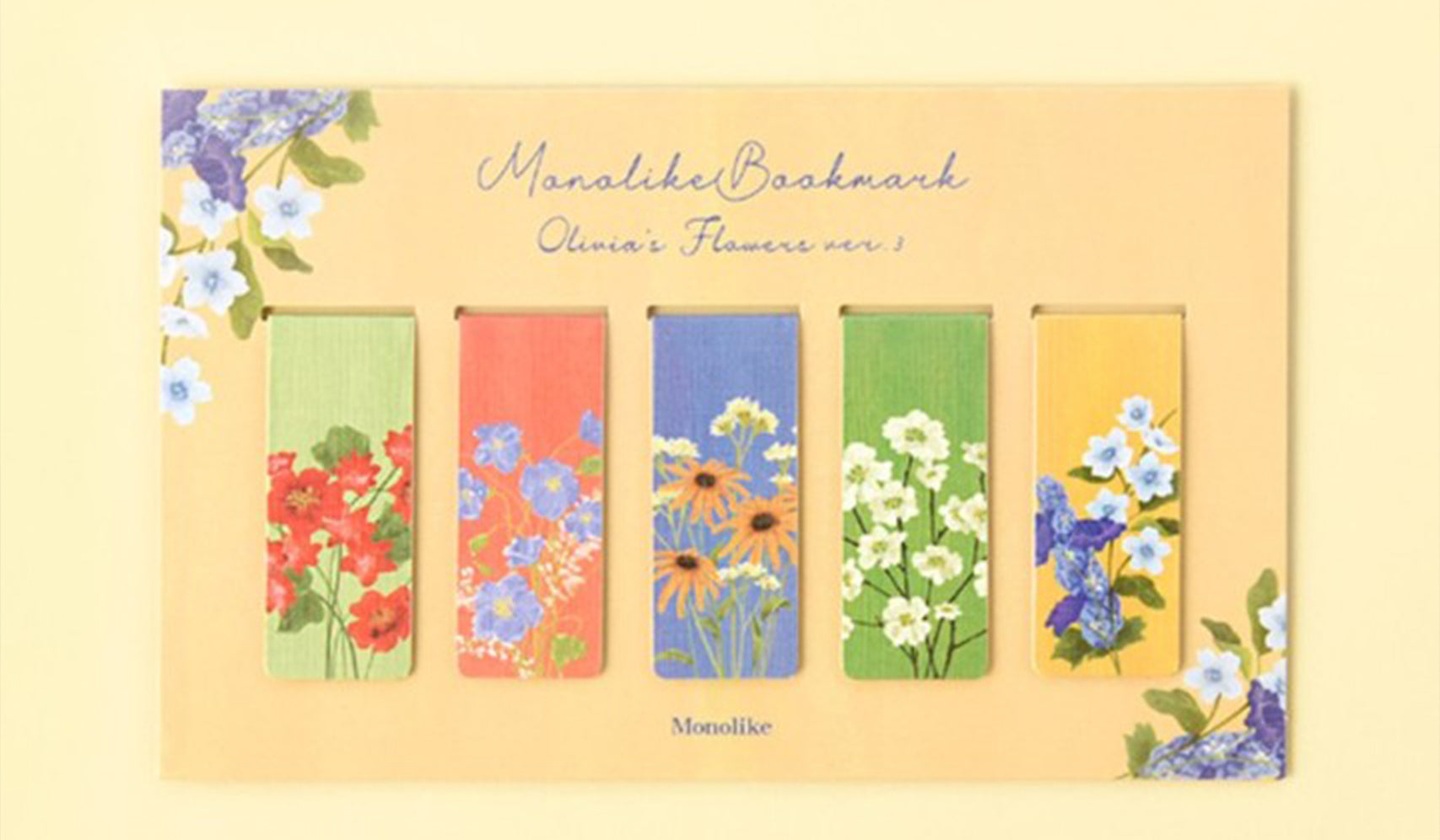 Monolike bookmarks with floral designs in vibrant colors on a yellow background.