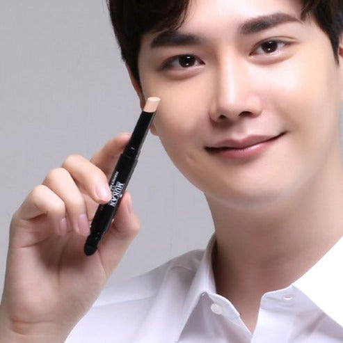 MUKAN Homme Perfect Spot Concealer shown held by a smiling gentleman model, Gentleman Korea branding, Korean men’s skincare concealer for spot coverage