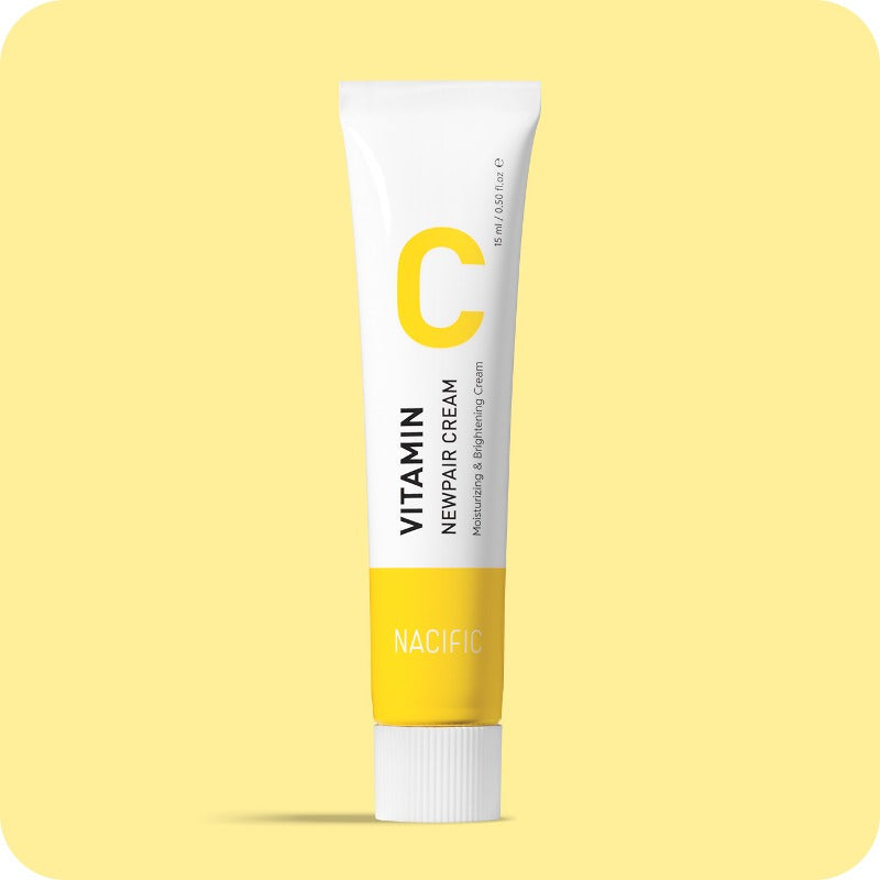 NACIFIC Vitamin C New Pair Cream 15ml in a yellow tube against a soft yellow background.