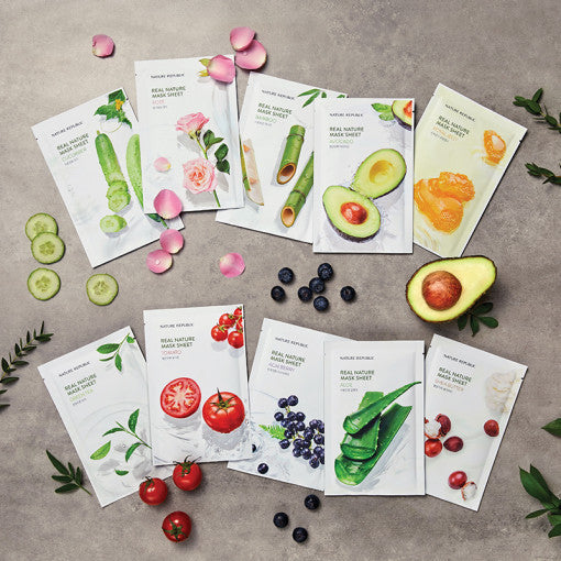 Collection of NATURE REPUBLIC Real Nature Mask Sheets with various natural ingredients displayed on a flat surface.