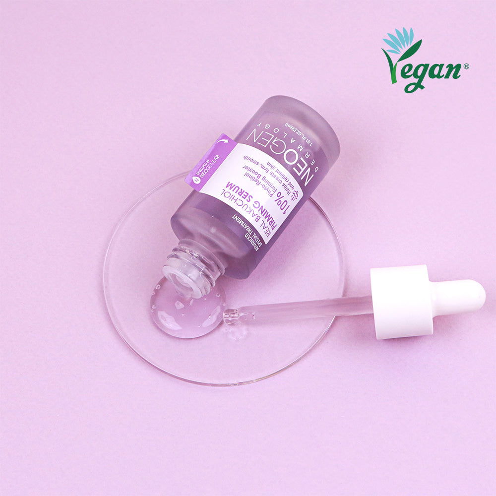 NEOGEN Real Bakuchiol Firming Serum 30ml bottle with dropper on pink background, vegan skincare product