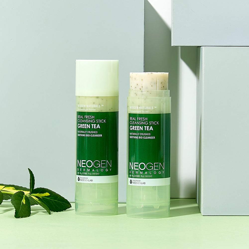 Image of NEOGEN Real Fresh Cleansing Stick Green Tea 80g with green tea leaves.