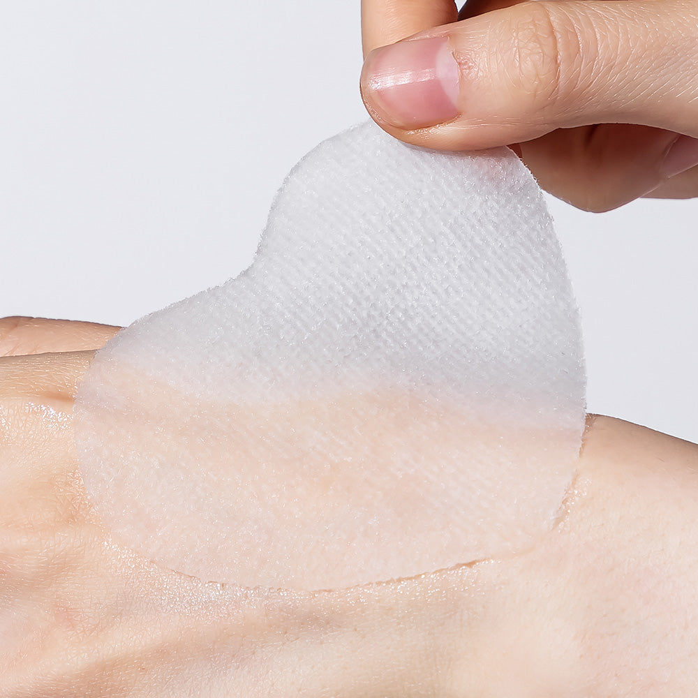 Applying NEOGEN Real Heartleaf Soothing Daily Mask 40 Sheets on skin for calming and hydration benefits.