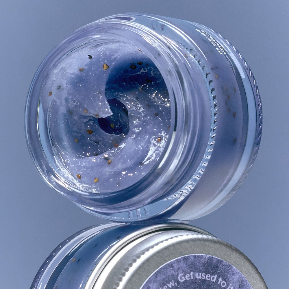 Open jar of NUSE Seed Care Lip Scrub showcasing its textured formula.