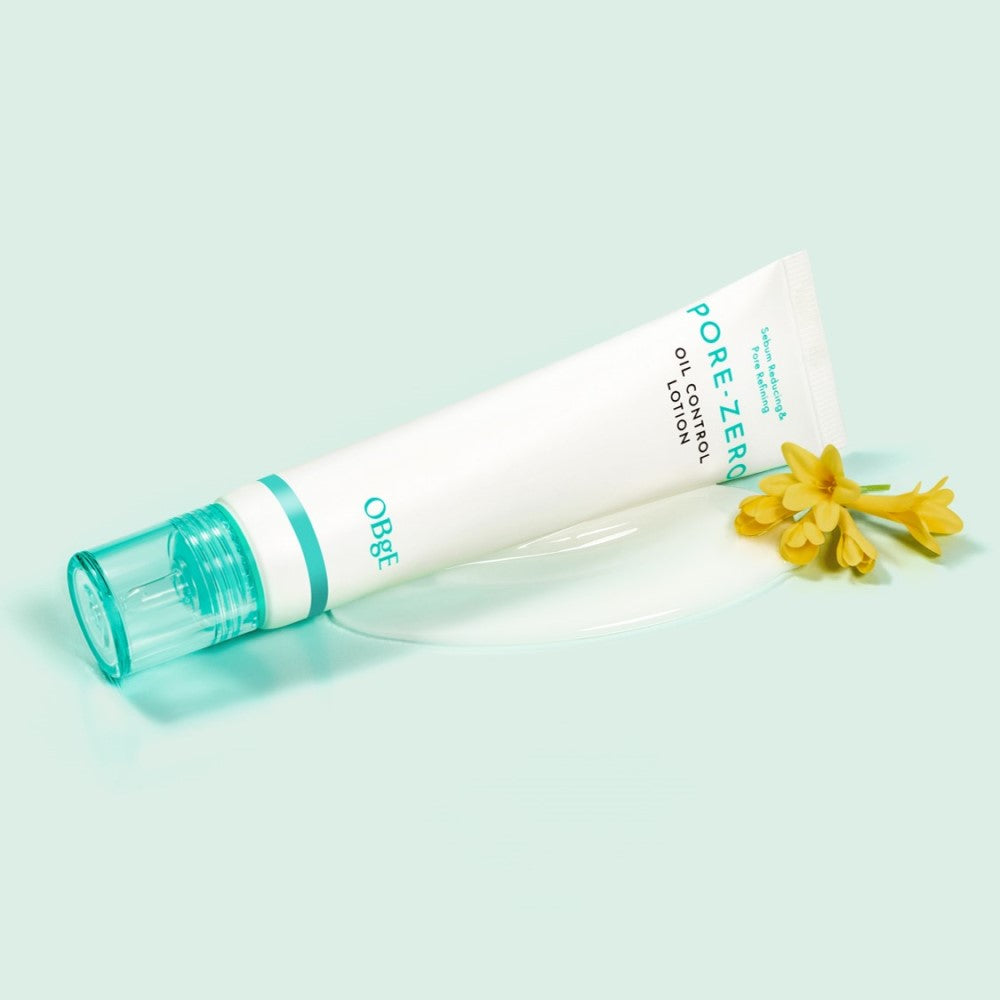 OBGE Pore Zero Oil Control Lotion 70ml product shot by Gentleman Korea, men's Korean skincare tube on mint background with yellow flowers