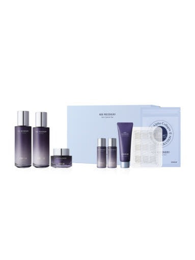 OHUI Age Recovery Basic Set 3-piece plan displayed with bottles and cream jar