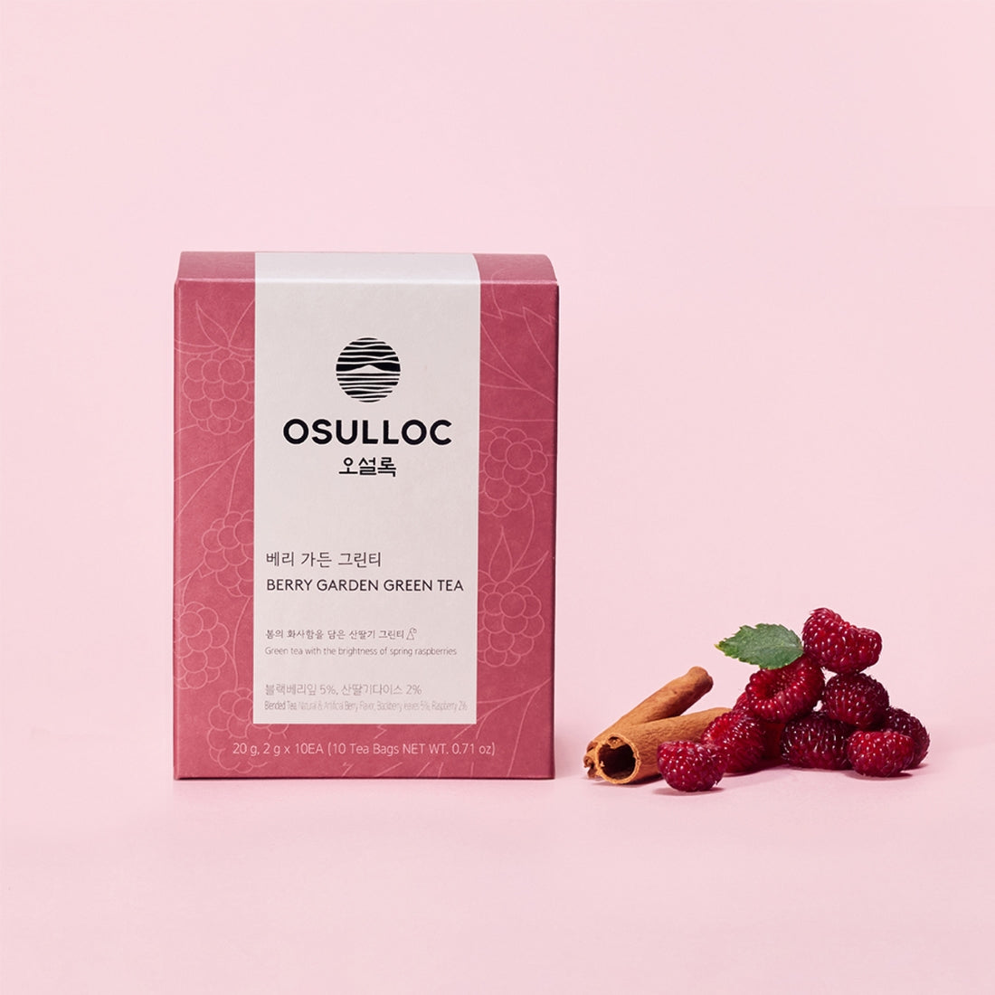 OSULLOC Berry Garden Green Tea 10 P with raspberries and cinnamon on a pink background.