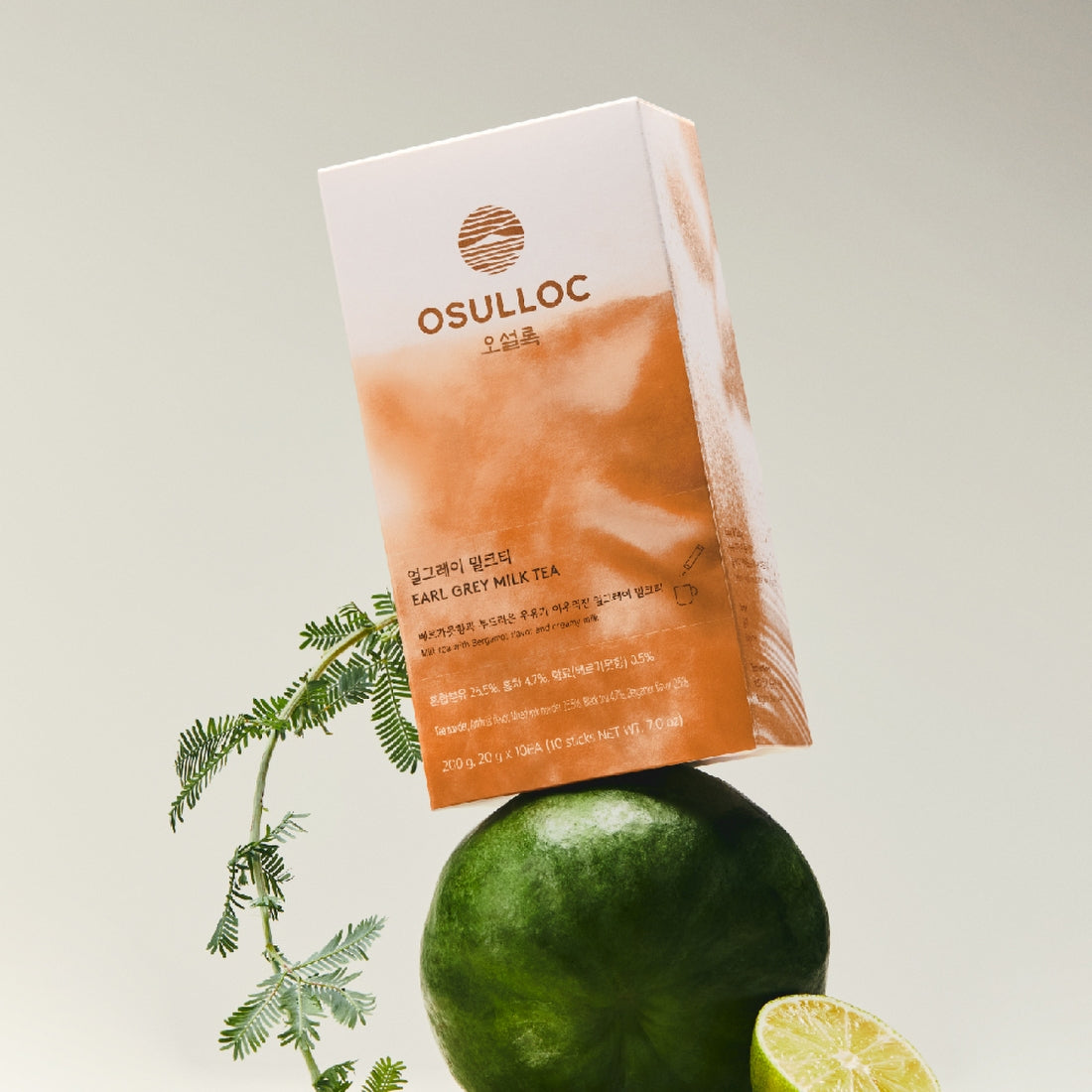 OSULLOC Earl Grey Milk Tea 10 p. packaging with citrus and botanical decor for a refreshing tea experience.