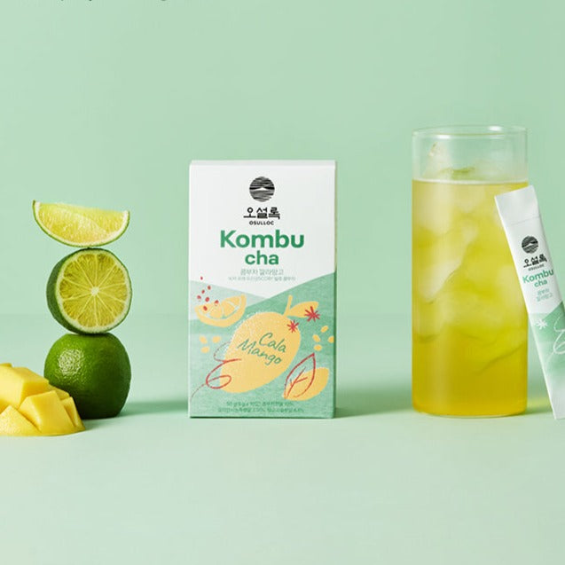 OSULLOC Kombucha Cala Mango flavor with fresh lime slice, beverage glass, and package on green background.