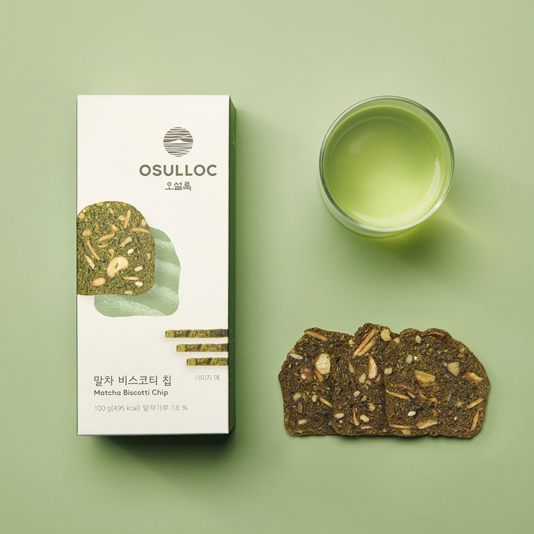 OSULLOC Matcha Biscotti Chips 100g package with green tea and biscotti chips on a green surface