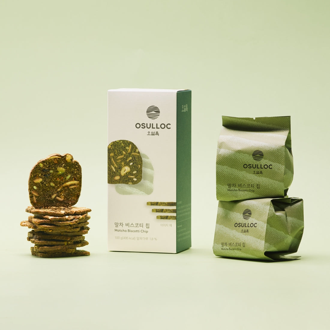 OSULLOC Matcha Biscotti Chips 100g packaging and stacked chips on green background