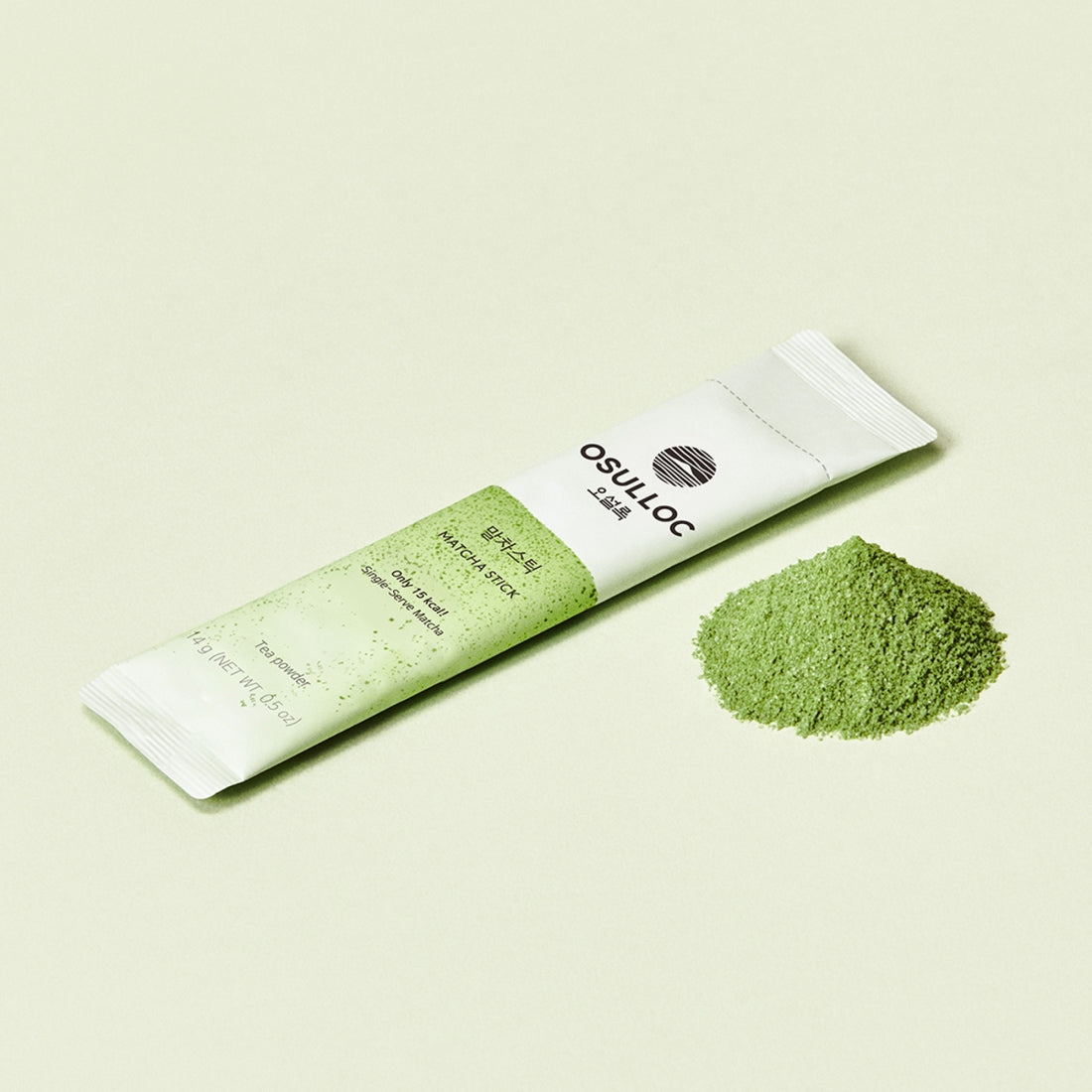 "OSULLOC Matcha Sticks 5 p. single stick on a light background with green matcha powder"