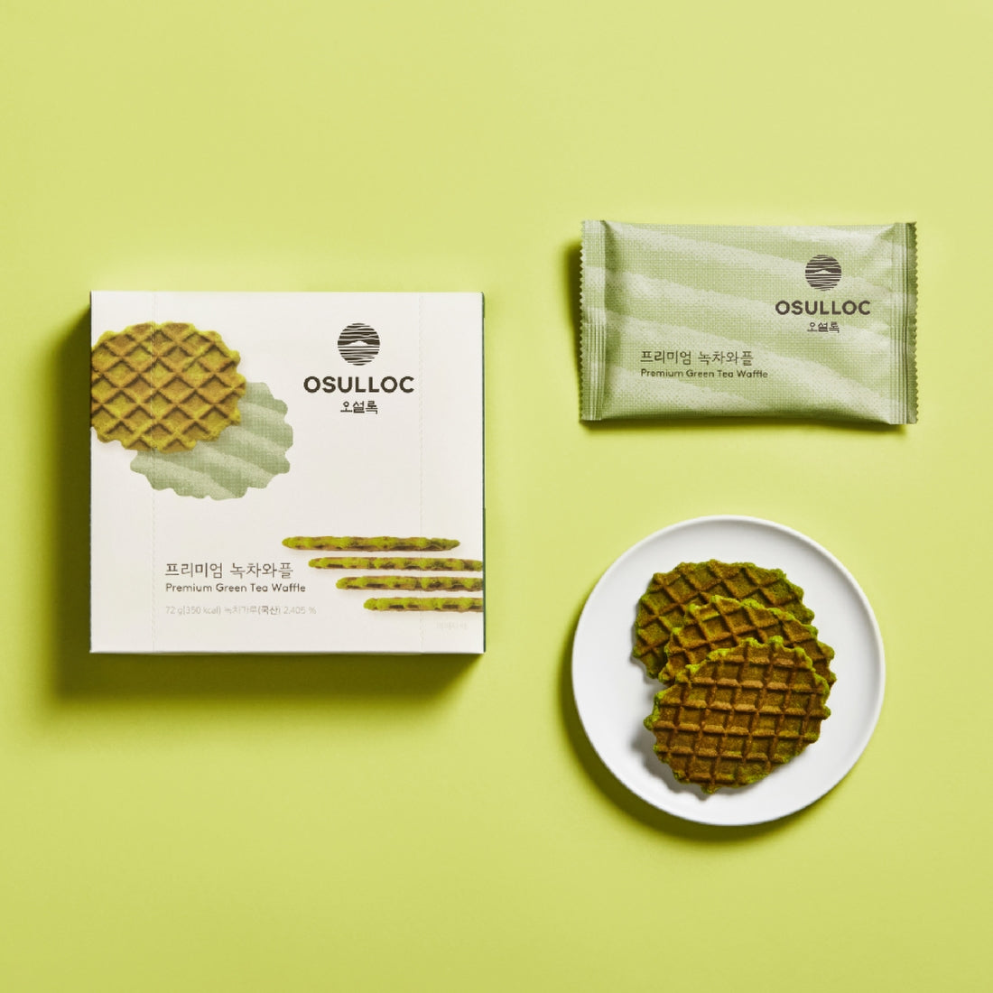 OSULLOC Premium Green Tea Waffle 72g packaging and product display on a plate on green background