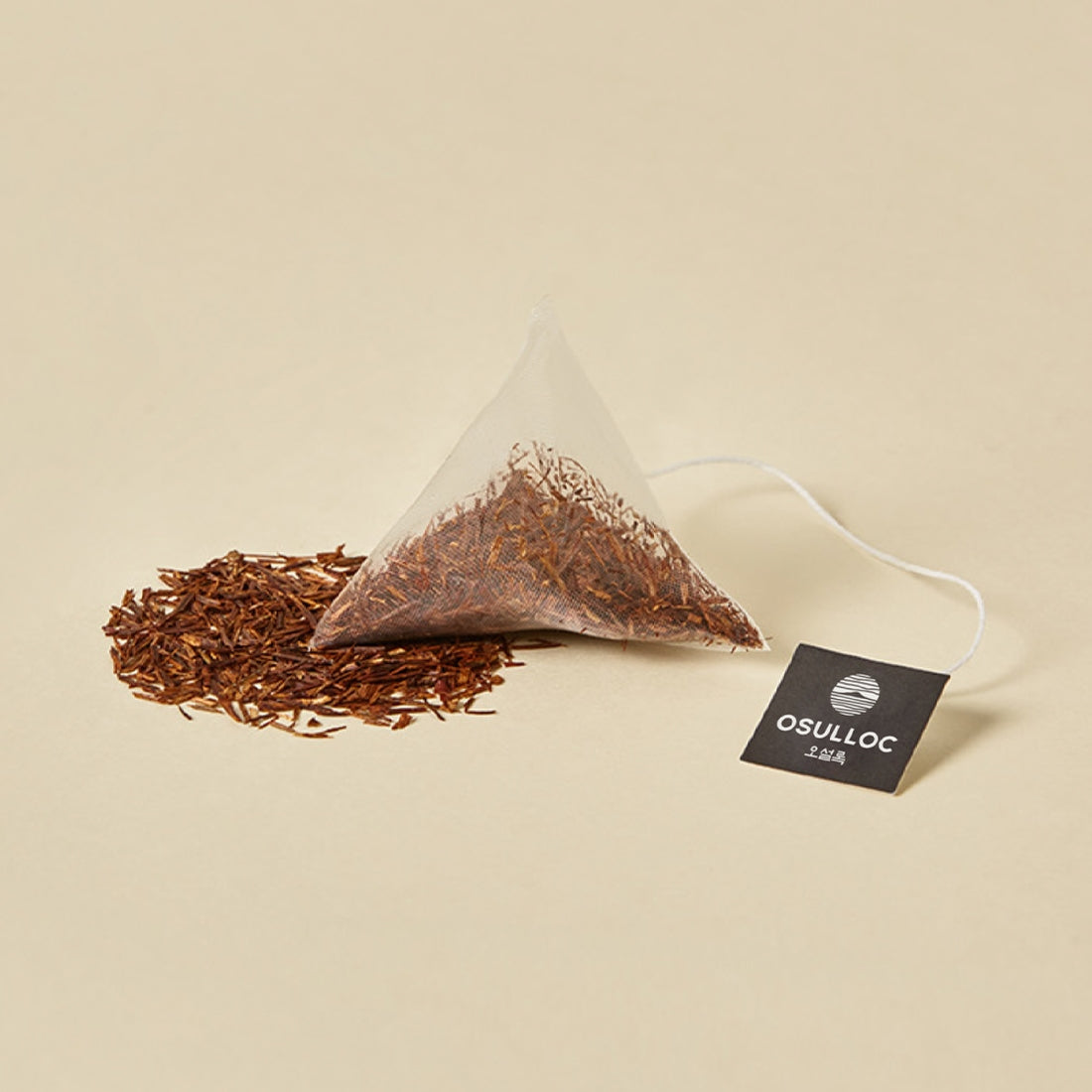 OSULLOC Rooibos Pure 10 p tea bag with loose tea on a neutral background