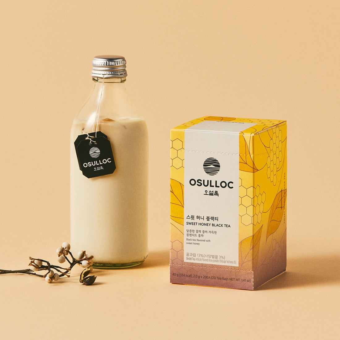 OSULLOC Sweet Honey Black Tea 20 P package beside milk bottle on table