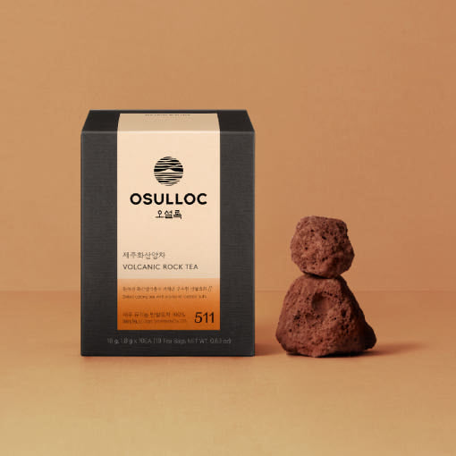 OSULLOC Volcanic Rock Tea 10p packaging next to a volcanic rock on a beige background.