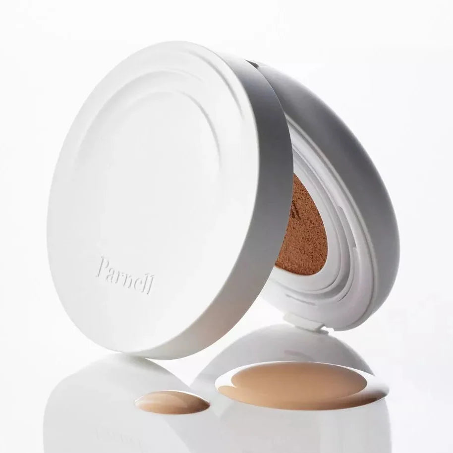 Open PARNELL Cicamanu Serum Cushion 15g with beige makeup liquid on surface
