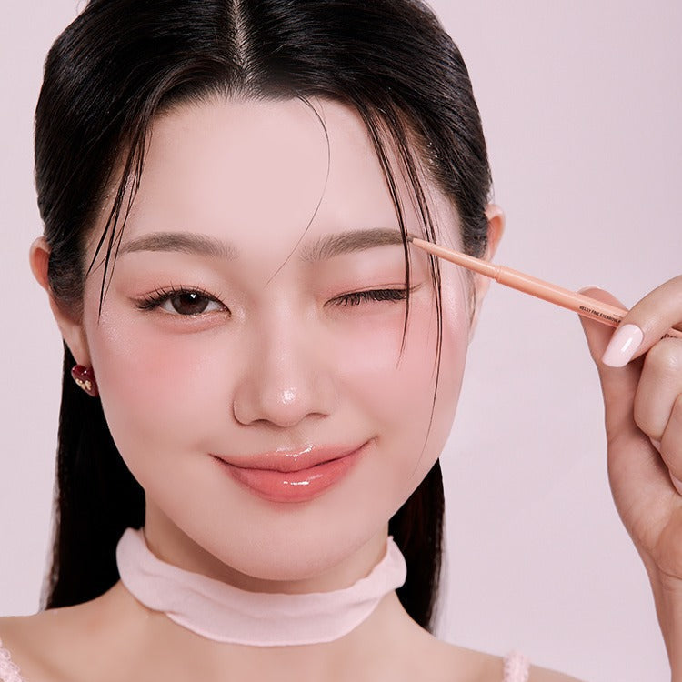 Woman using PASSION CAT Relay Fine Eyebrown Pencil 0.09g to enhance brows