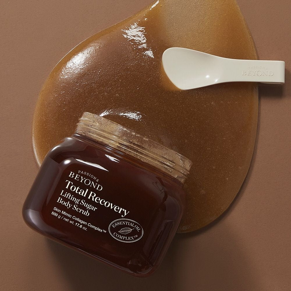PASSION&BEYOND Total Recovery Lifting Body Scrub 500g with spoon on brown background