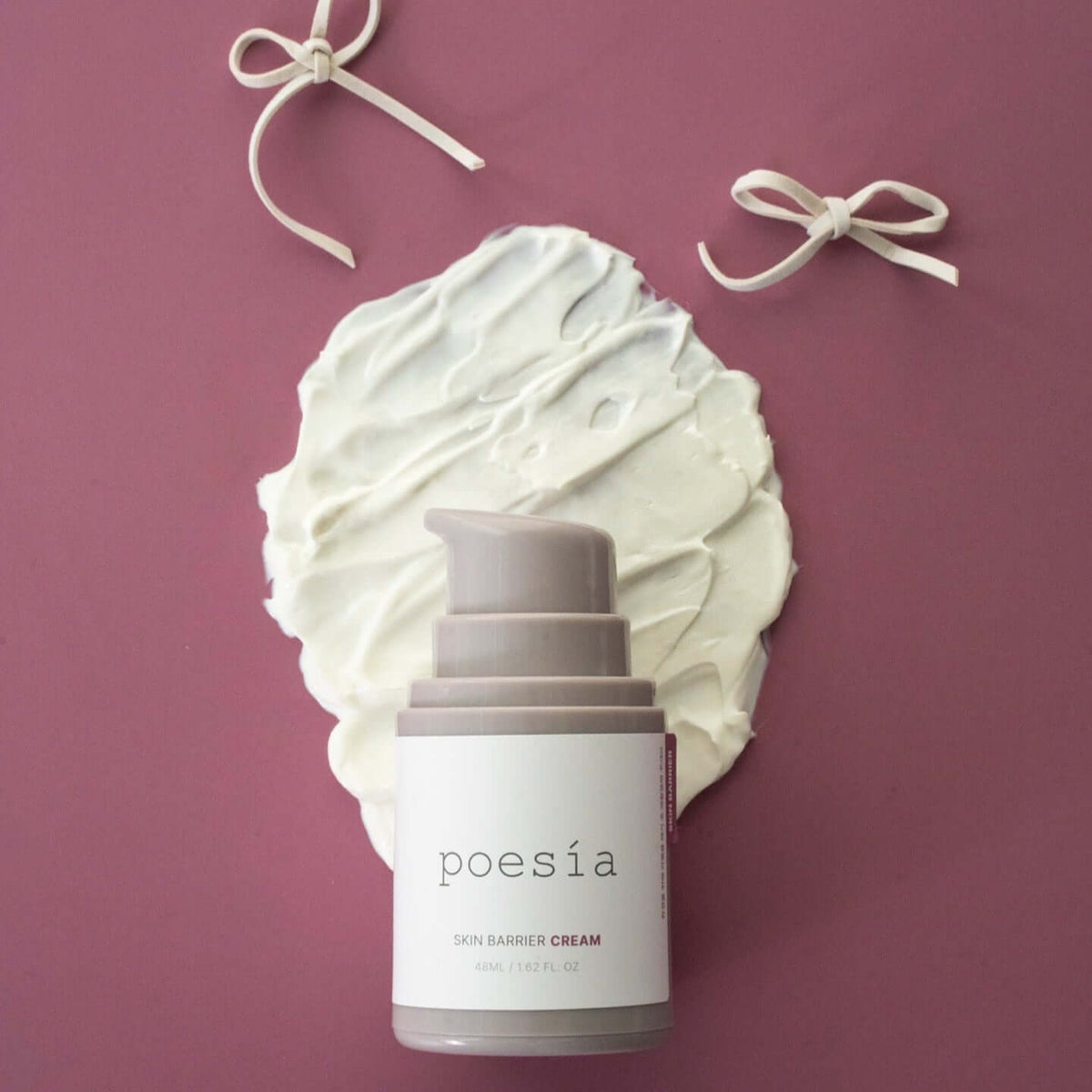 POESÃA Ceramide 3 Liposome Intensive Skin Barrier Cream 48ml on a textured background with decorative bows.